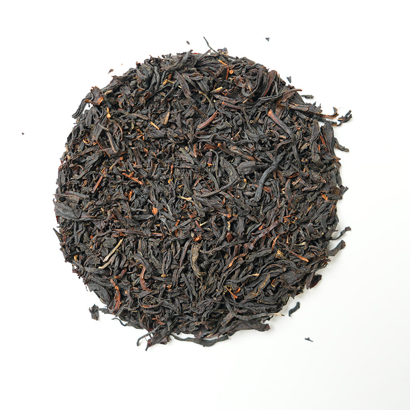 Organic Naturally Smoked Souchong Black Tea | Traditional pine smoke aroma wrapped in the sweetness of wild honey | Vibrant black tea with a golden ring | Certified Organic Black Tea | Limited Edition Handcrafted
