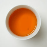 Organic Naturally Smoked Souchong Black Tea | Traditional pine smoke aroma wrapped in the sweetness of wild honey | Vibrant black tea with a golden ring | Certified Organic Black Tea | Limited Edition Handcrafted